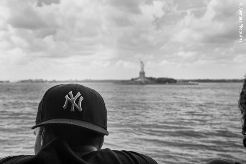 NYC, Staten Island ferry, baseball cap, statue of liberty