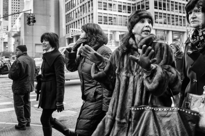 NYC street photography, woman wearing fur