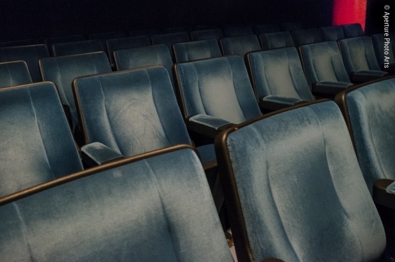 NYC, movie theatre, interior, blue velour seats, empty