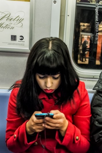Subway, NYC, street photography, pretty girl in red, iphone, reading
