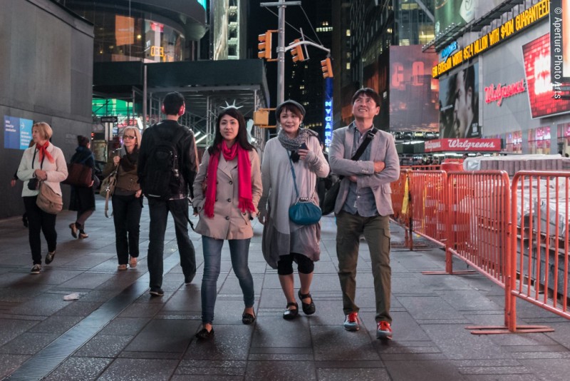 Trio of tourists on Times Square, New York City