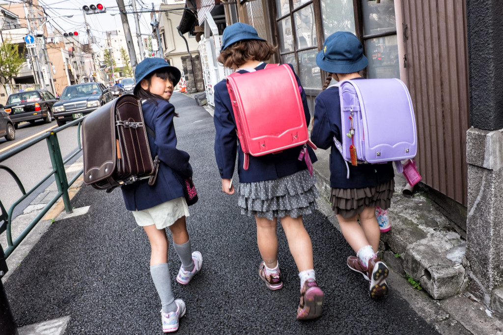Japanese Schoolgirls with backpacks, street photography, streets of Tokyo