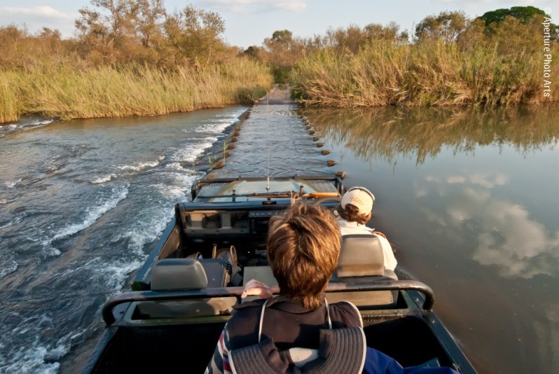 Rangerover crossing a river, South Africa, Safari
