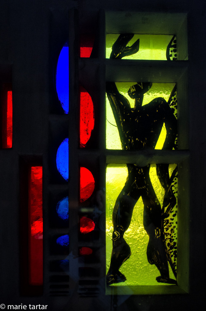 Modulor Man in stained glass at La Cité Radieuse in Marseille