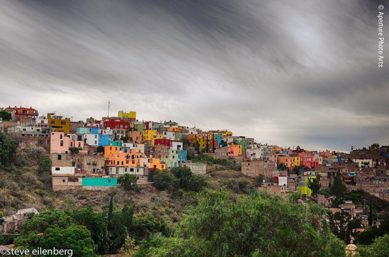Guanajuato Mexico, colorful houses, hill side, clouds, interesting sky