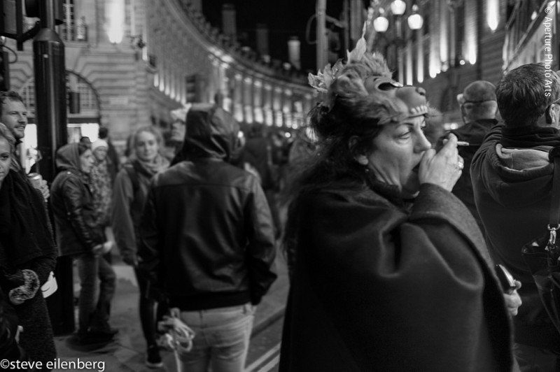 London England, night photography, street photography, fat girl, fat woman, fat with cigarette, mask, party