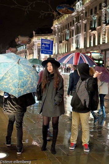 London England, night, street photography, oriental girl, hat