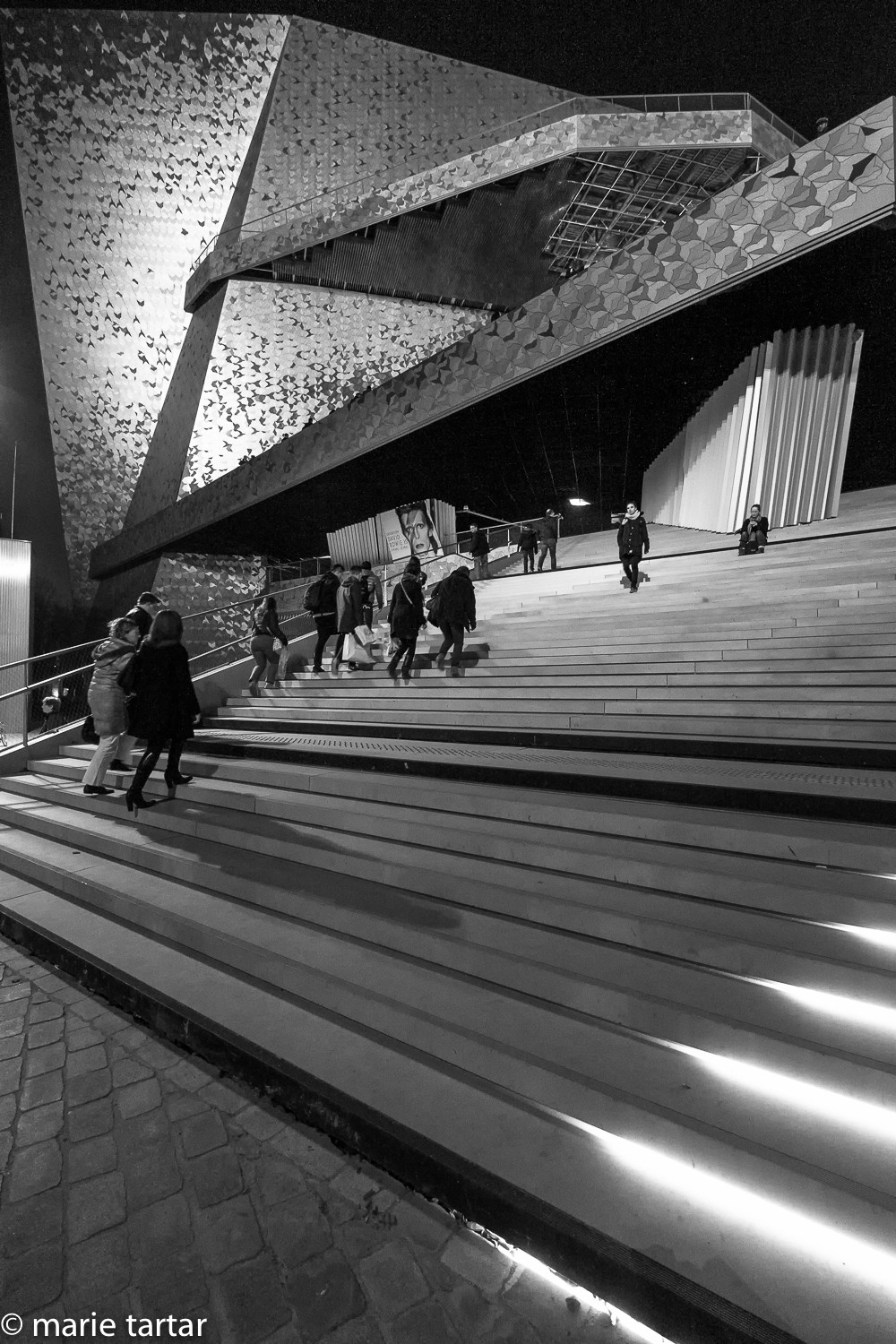 Ascending Le Grand Escalier at the Paris Philharmonie in Parc de la Villette