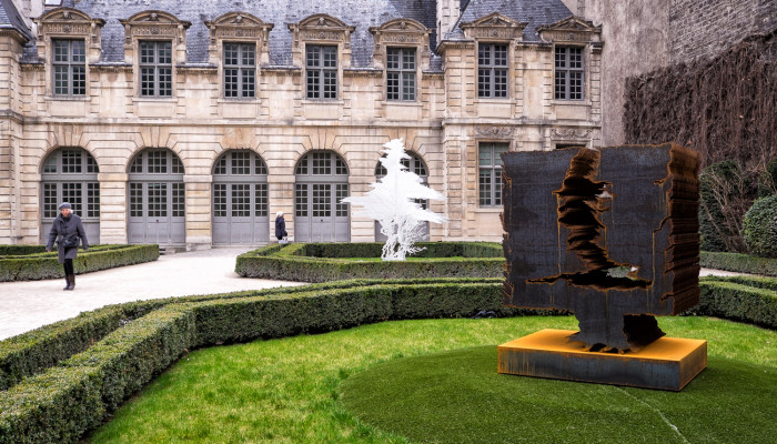 Contemporary tree sculptures add a new element to Hotel de Sully's garden