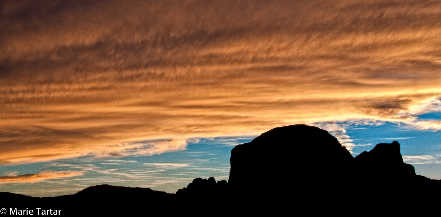 Monument Valley silhouette with fantastic cloud bank
