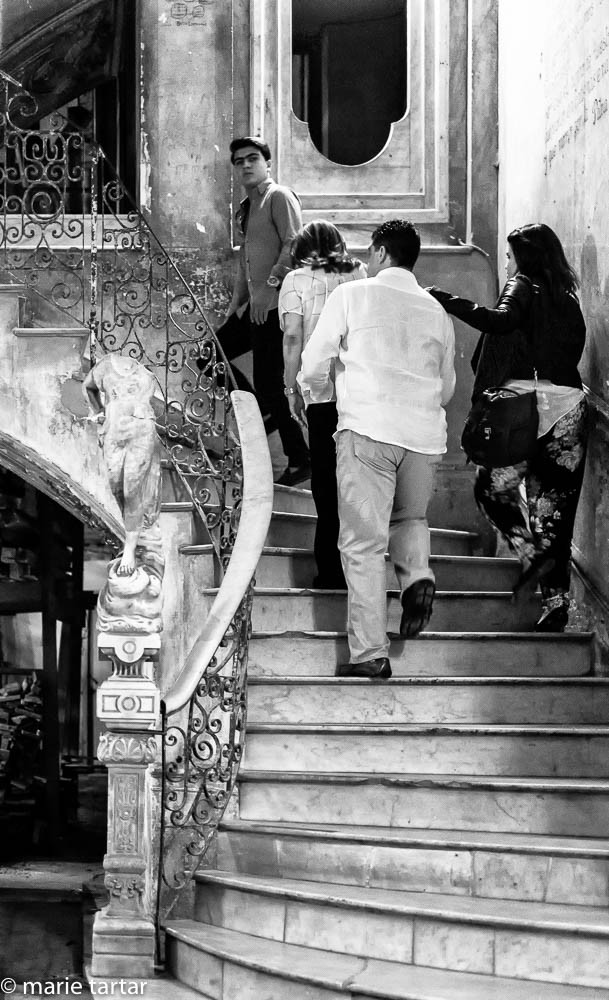 Paladar La Guarida marble staircase with diners