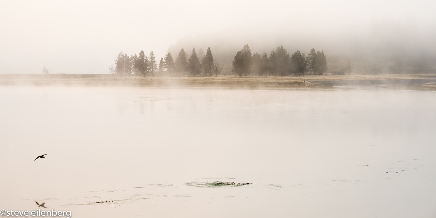 Yellowstone lake foggy sunrise, Wyoming