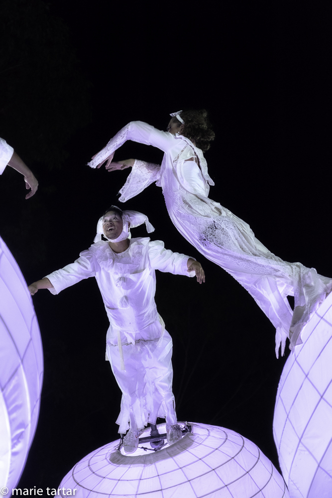 Performers I dubbed "The Maiden" and "The Baby" interact overhead in Spheres.