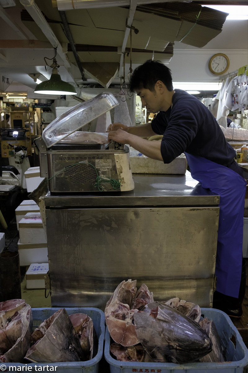 Seafood is encased in cellophane for shipping at Tsukiji