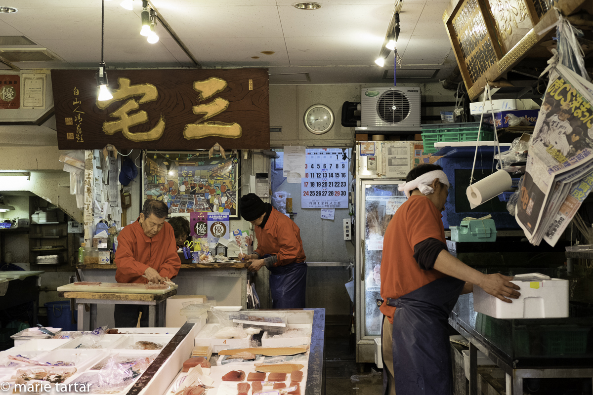 Wrapping up the orders for shipping at Tsukiji in Tokyo