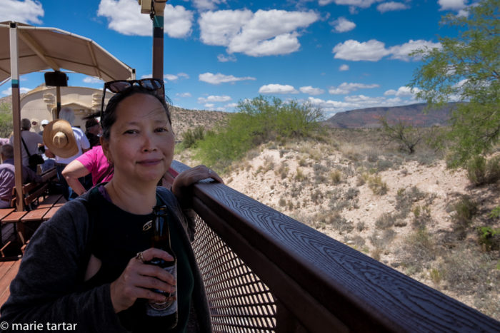 Yes, there was a bar on the train; my sister Clarissa enjoys a cool beer while eyeing the Coconino and Prescott National Forest scenery