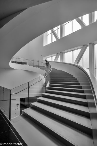Sinuous curves of the staircase in the Piere Lasonde Pavilion, a recently inaugurated OMA-designed addition to MNBAQ