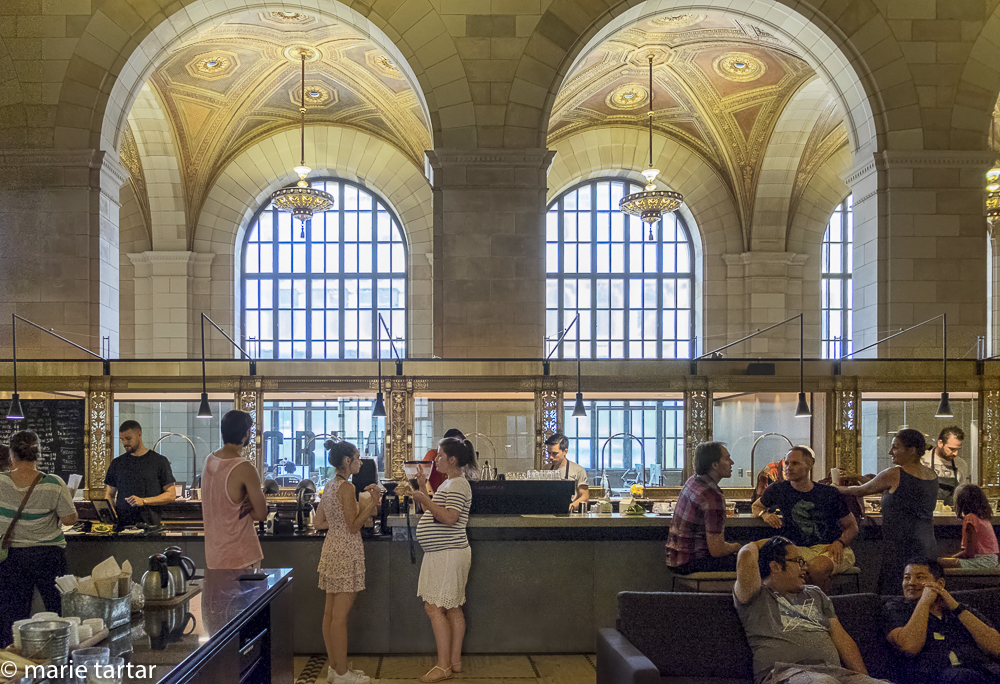 Gorgeous architectural adaptive reuse-a café (Crew Collective) in a beautiful former bank...order and pick up your food at former teller's windows 