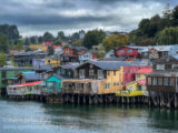 Traditional fishing houses on stilts in Castro, the capital of Chiloé Island in Chile.